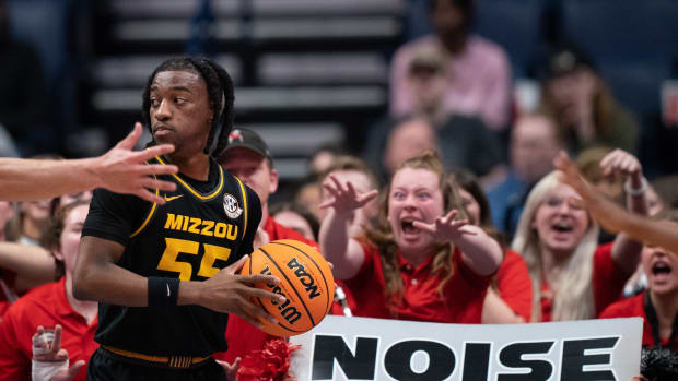Missouri Tigers guard Sean East II (55) tries to inbound the ball against the Georgia Bulldogs during their first round SEC Men's Basketball Tournament at Bridgestone Arena in Nashville, Tenn., Wednesday, March 13, 2024.